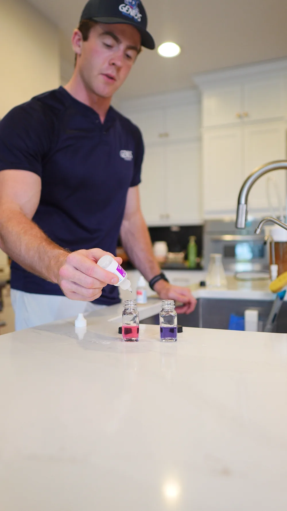 Genius Water Co. technician performing an in-home water test