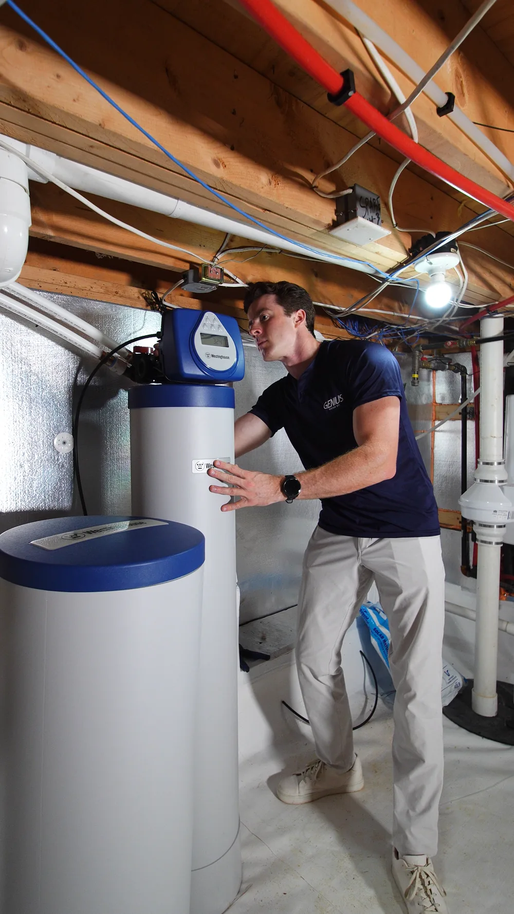 Genius Water Co. team installing a multi-tank well water treatment system